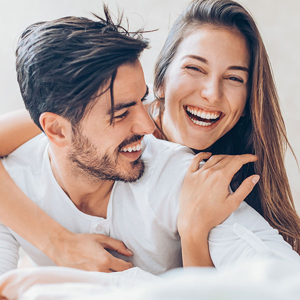 Happy Couple with Beautiful Smile after teeth whitening services in Scottsdale AZ