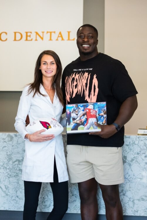 Michael Dogbe with Dr Bri at S&C Dental with whitened teeth Scottsdale AZ