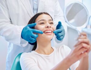 Smiling woman with the Dentist in Scottsdale, AZ