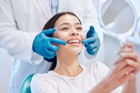 Smiling woman with the Dentist