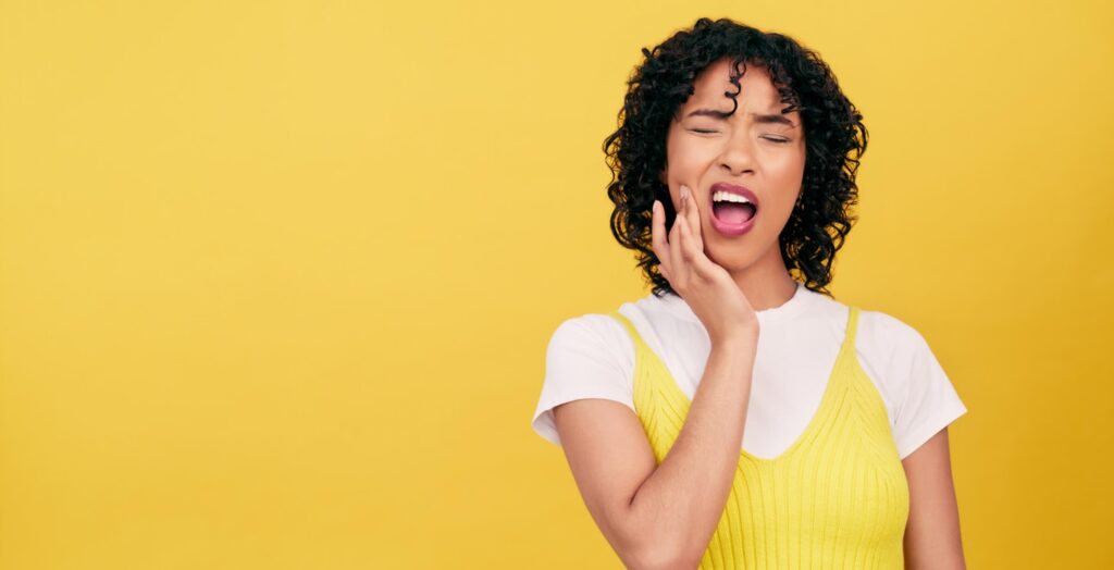 A person experiencing tooth pain